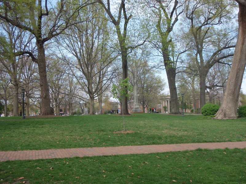 P4020116.JPG - Joseph Caldwell, UNC’s first president. Obelisk on McCorkle Place.  Graham Memorial (far right background)