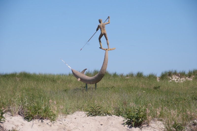 DSC_7734.jpg - "Swordfish Harpooner" sculpture by Jay Lagemann. Installed at Menemsha Harbour in July 1994.