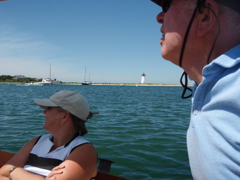 MV071109-7110139.jpg - Cathie and Luke.  Edgartown Lighthouse (background)