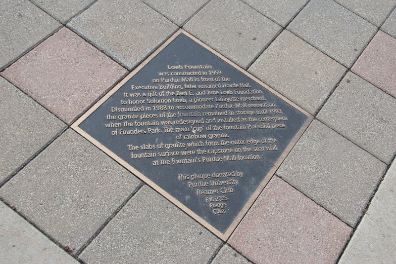 Purdue092609-9549.jpg - Loeb Fountain was constructed in 1959 on Purdue Mall in front of the Executive Building, later renamed Hoved Hall. It was a gift of the Bert and June Loeb Foundation to honor Solomon Loeb, a pioneer Lafayette merchant. Dismantled in 1988 to accommodate Purdue Mall renovation, the granite pieces of the fountain remanined in storage until 1993, when the fountain was redesigned and installed as the centerpiece of Founders Park.  The main cup of the fountin is a solid piece of rainbow granite.  The slabs of granite which form the outer edge of the fountain surface were the capstone on the seat wall at the fountain's Purdeu mall location.  The plaque dontaed by Purdue Univerisity Reamer Club, Fall 2005 Pledge Class