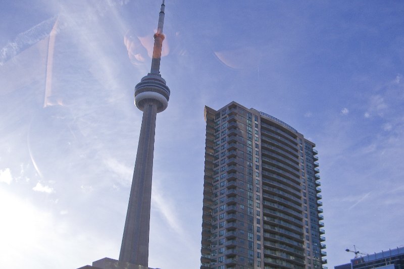 Toronto092409-1989.jpg - CN Tower and Infinity Condominiums (right). View looking North from Toronto's Gardiner Expressway, driving West