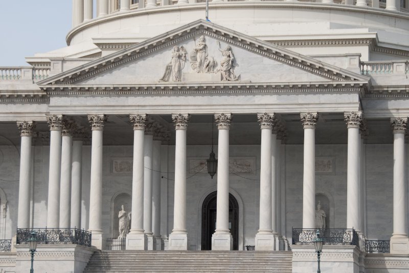 WashDC032709-4246-2.jpg - The East Front of the U.S. Capitol, The Columbus Doors, The sculptural pediment "Genius of America"