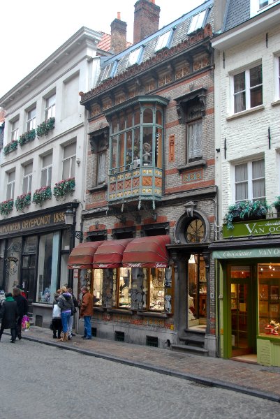 Bruge021710-1745.jpg - Walking North on Wollestraat.  Belfort on left side.