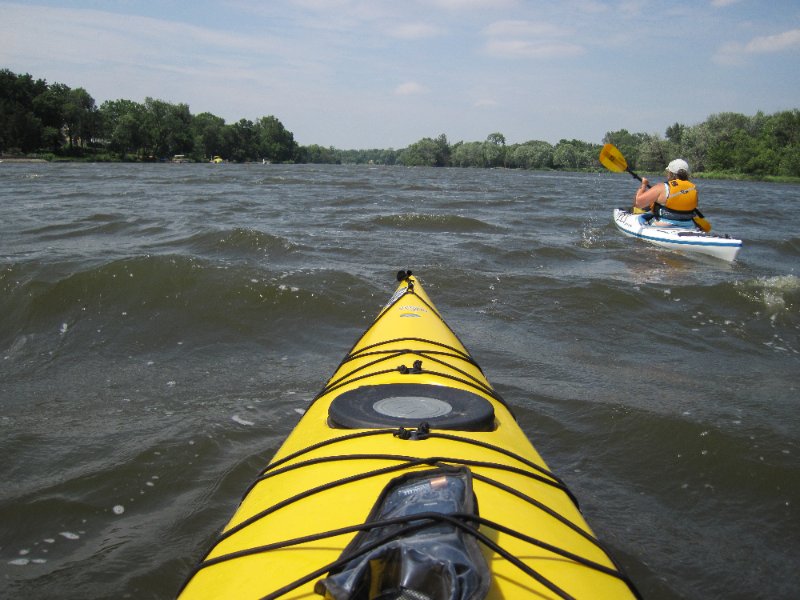 IMG_1369.jpg - Cathie (rudderless) and Jack paddleing upstream in 2 foot waves (with the wind)