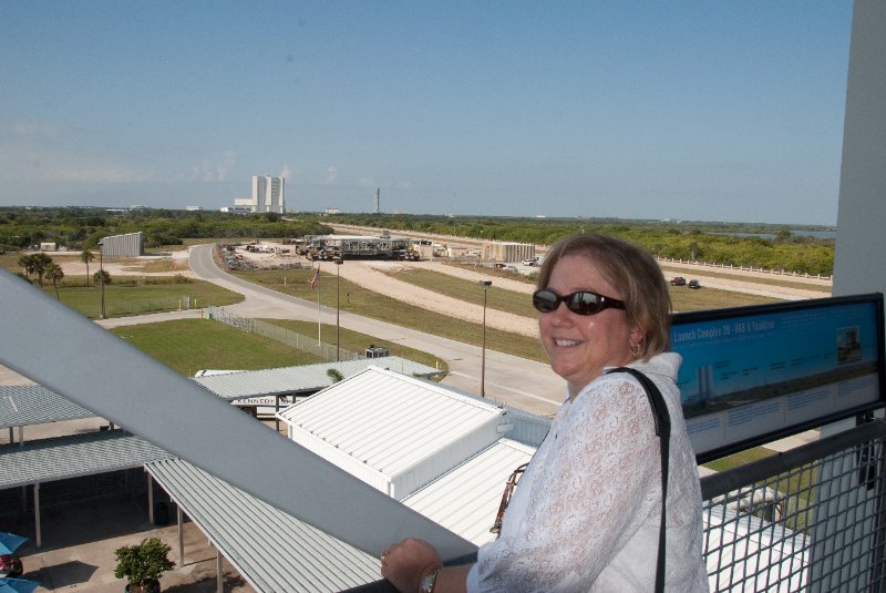 KSC110110-6429.jpg - Cathie with view of Vehicle Assembly Building and Crawler Transporter