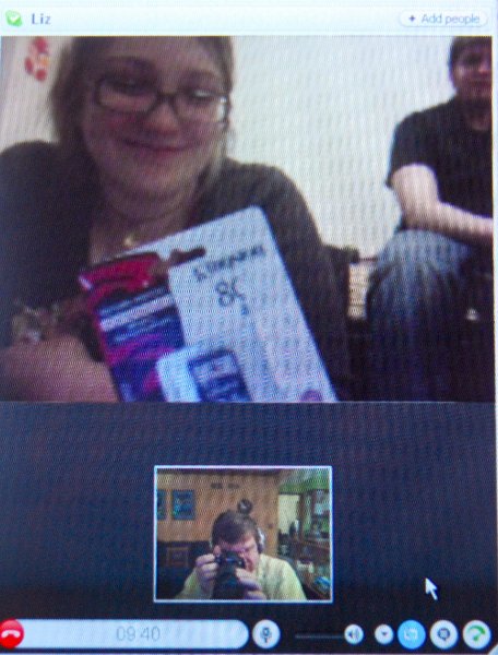 Liz21stBday020510-0706.jpg - Happy 21st Birthday!!  Celebrating Liz's Birthday.  She's opening her presents, over a Skype connection.