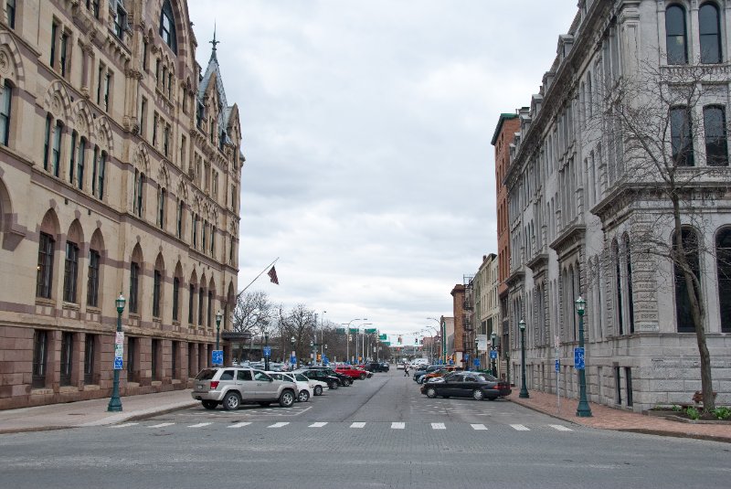 Syracuse040910-2124.jpg - Looking East along the former Erie Canal.  Syracuse Savings Bank  (left), The Gridley Building (right)