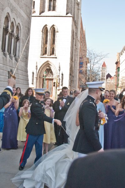 Syracuse041010-2216.jpg - Maureen and Tyson walking the traditional Sword Arch after their Wedding ceremony.  In front of the Cathedral of the Immaculate Conception.