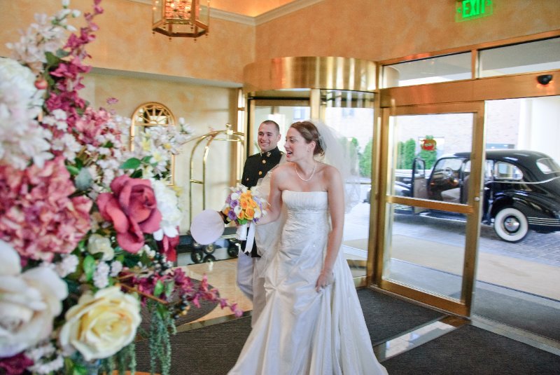 Syracuse041010-2246.jpg - Maureen back from the wedding in the lobby of the Genesee Grande Hotel just before the reception starts