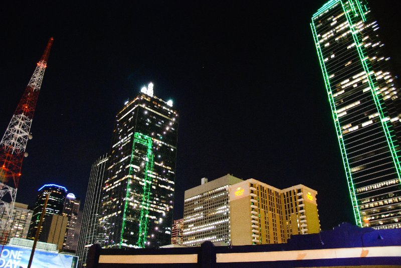 Dallas110910-6702nn.jpg - Bank of America Plaza (right) reflection in Renaissance Tower (green neon)