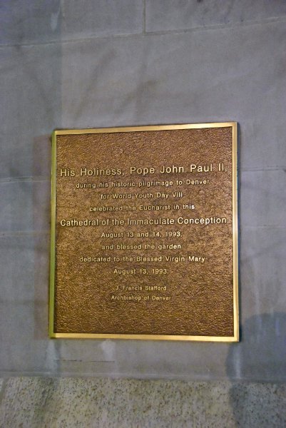 Denver041410-2357nn.jpg - "His Holiness, Pope John Paul II, during his historic pilgrimage to Denver for World Youth Day VIII, celebrated the Eucharist in this Cathedral of the Immaculate Conception, August 13 and 14, 1993, and blessed the garden dedicated to the Blesed Virgin Mary August 13, 1993.  J. Francis Stafford, Archbishop of Denver. " Plaque on the Cathedral of the Immaculate Conception