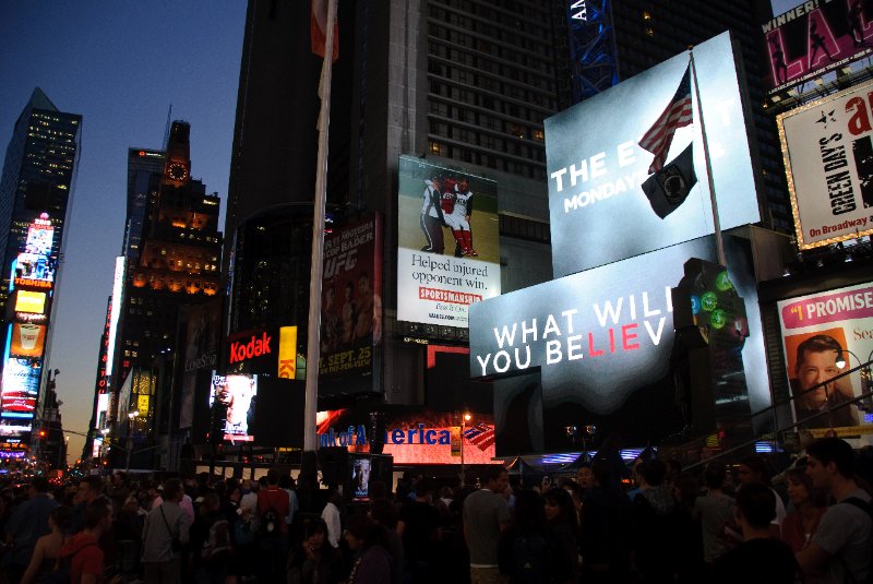 DSC_5864.jpg - People gathering in the Duffy Square area for "The Event" premiere. Marriott Marquis Hotel (background, center). 1 Times Square, Times Square Tower (left edge)