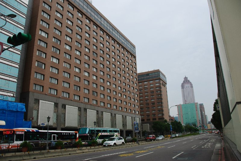 Taiwan060210-3106.jpg - Sheraton Taipei (left), Shin Kong Life Tower (skyscraper). View looking West on Zhong Xiao East Road.