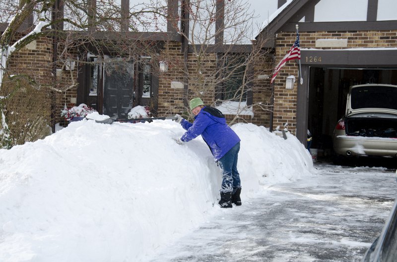 DSC_0592.jpg - Shoveling our driveway