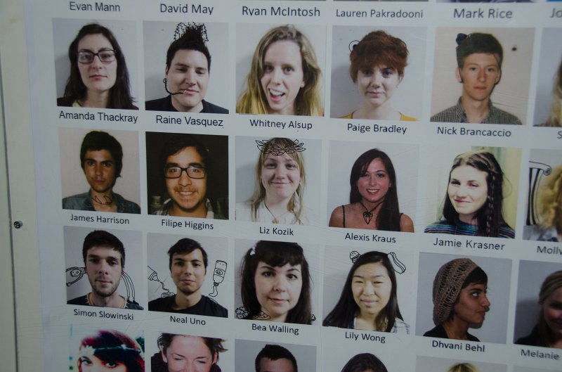 Providence060211-3311.jpg - Liz's picture with other Printmaking Majors on the wall of Benson Hall