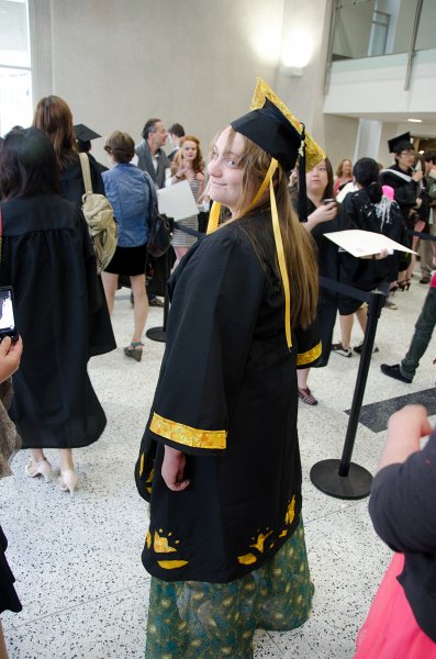 Providence060211-3654.jpg - Liz just after graduation ceremony showing us her cap and gown design
