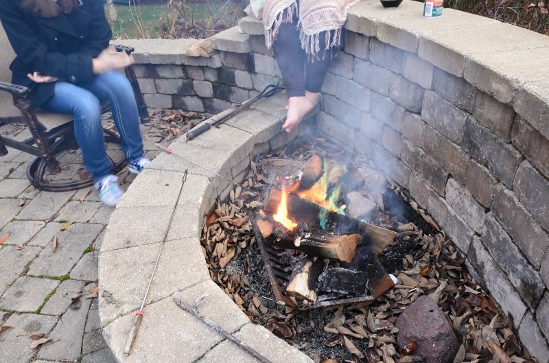 ThanksgivingNov2011-7343.jpg - Liz and Emily at the patio fireplace