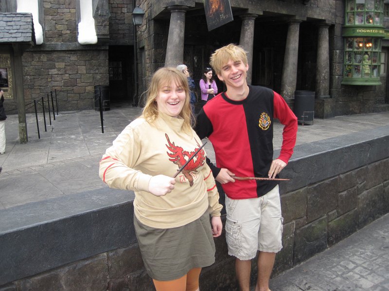 UniversalStudio030511-2381.jpg - Liz and Mike in front of The Three Broom Sticks, Hogsmeade, Harry Potter World