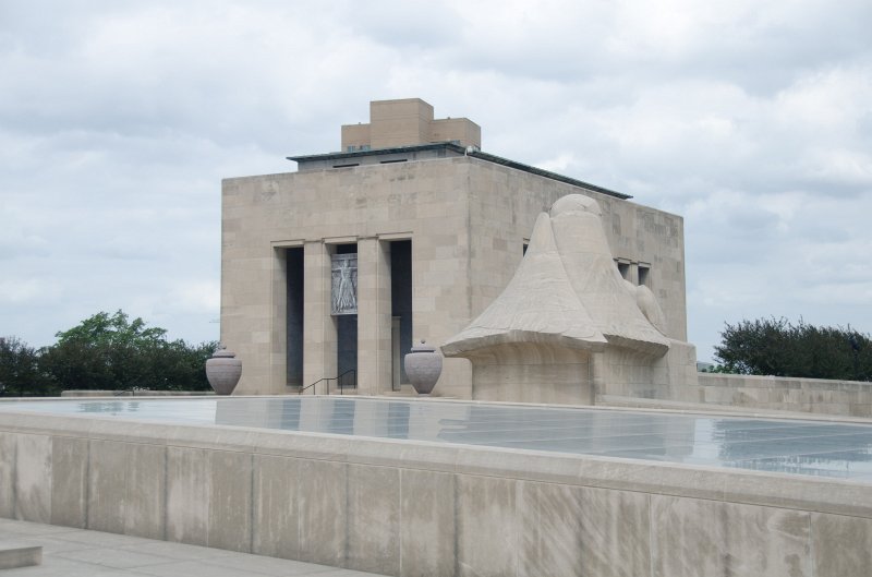 KansasCity062011-3906.jpg - Liberty Memorial Sphinx hiding its face, named "Future" -- looking West, Memory Hall (background)