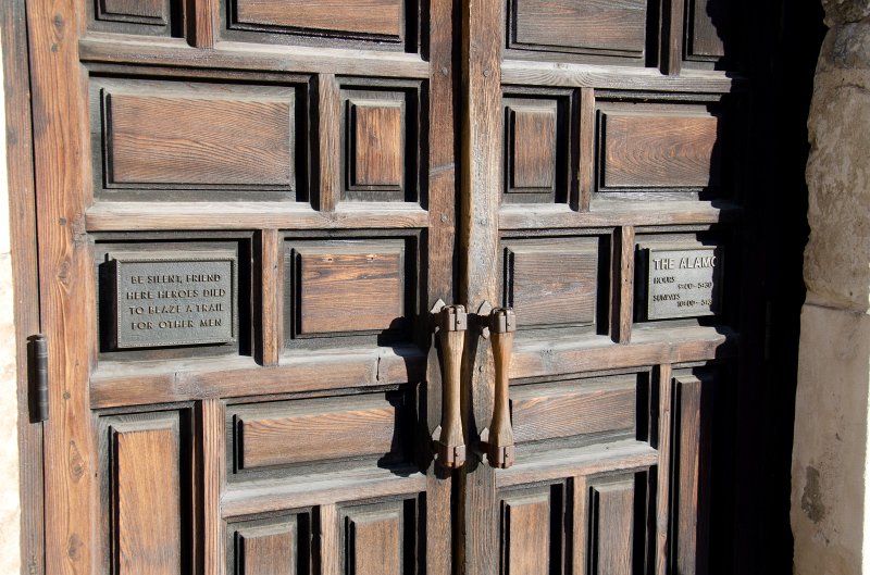 SanAntonio020711-0715.jpg - The Alamo front door:  "Be silent, friend here heroes died to blaze a trail for other men"