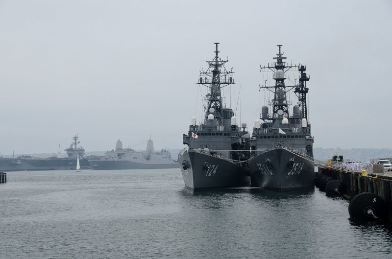 SanDiego062411-4030.jpg - The Japanese Navy destroyers Asagiri (3516) and Mineyuki (124), B Street Pier, USS New Orleans (background, 18), Carl Vinson (background, 70)