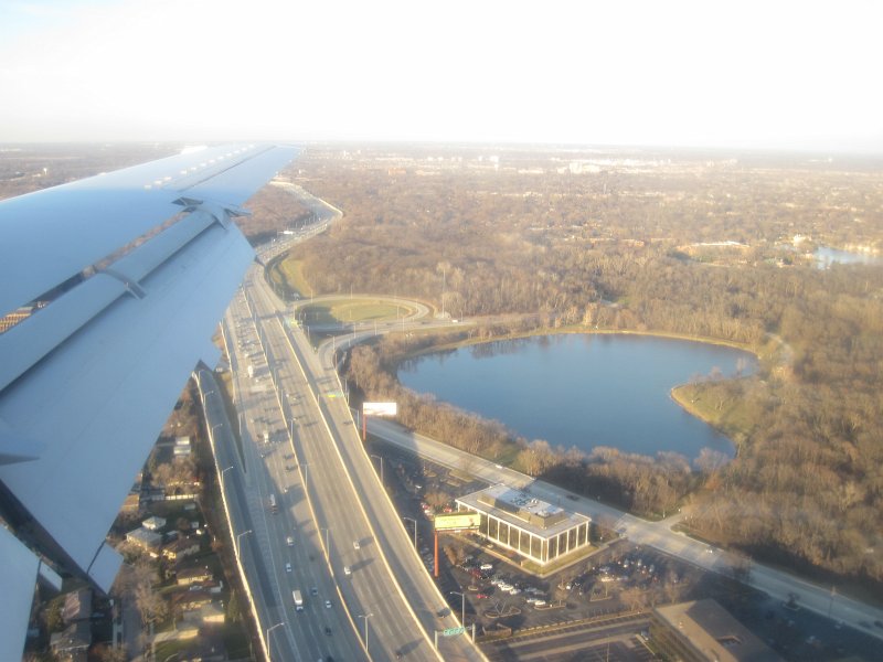 TorontoFlighttoChicago121611-3606.jpg - Axehead lake at 294/Touhy Ave interchange. PCI Corp building on Des Plains River Road.