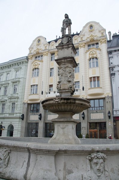 Bratislava012212-8289.jpg - Maximilian Fountain, Palace of the Hungarian exchange bank (background), Main Square / Hlavné námestie