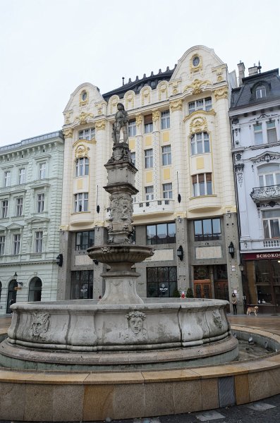Bratislava012212-8288.jpg - Maximilian Fountain, Palace of the Hungarian exchange bank (background), Main Square / Hlavné námestie