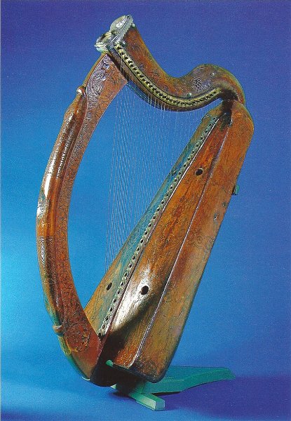 Dublin010212-010312-1.jpg - Trinity College Brian Boru Harp.  This 15th or 16th Century harp is the oldest surviving Irish harp and has been erroneously associated with Brian Boru, High King of Ireland (d 1014). Made of willow it as 29 strings and is housed in the Long Room, Trinity College, Dublin  (scan)