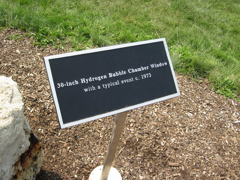 FermiLabBike091612-4214.jpg - 30-inch Hydrogen Bubble Chamber Window with a typical event c 1973