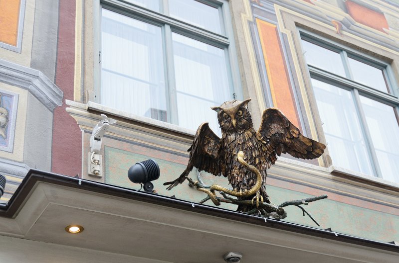 Fussen051212-0810.jpg - Owl and Snake bronze statue above the Stadt-Apotheke  Füssen