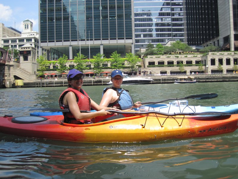 KayakChicagoRiver071412-3887.jpg - Bin and Liz in front of the 321 North Clark building (former Quaker Oats HQ), near Clark St bridge