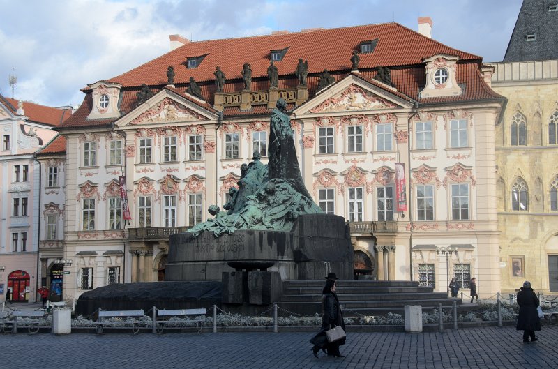 Prague012312-8485.jpg - Jan Hus Memorial, Old Town Square.  Kinský Palace (background right)