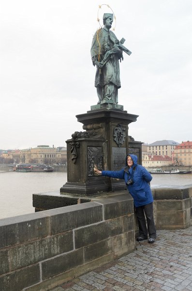 Prague012312-8820.jpg - Molly and the statue of John of Nepomuk, Charles Bridge / Karlův most