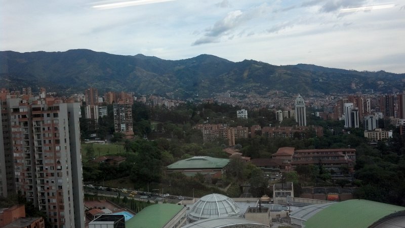 2012-07-27_17-55-39_440.jpg - Late afternoon view of Medellin, from the Forum Skyscraper, 23rd floor
