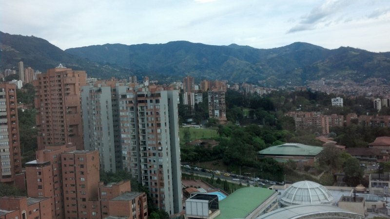 2012-07-27_17-55-46_770.jpg - Late afternoon view of Medellin, from the Forum Skyscraper, 23rd floor