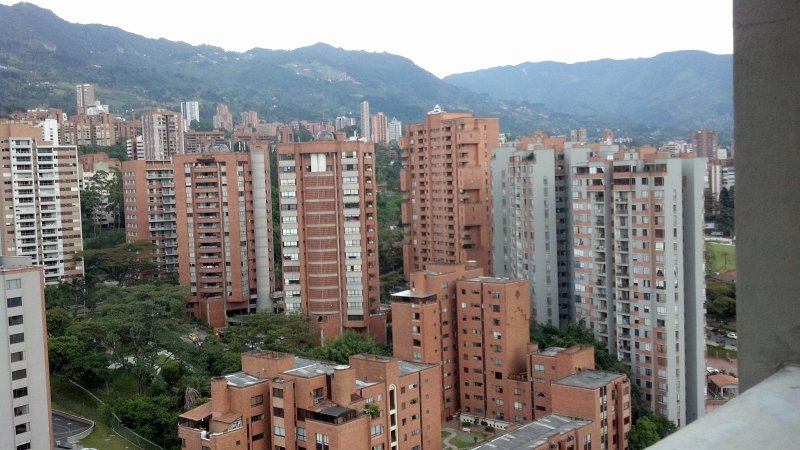 2012-07-27_19-03-09_570.jpg - Late afternoon view of Medellin, from the Forum Skyscraper, 23rd floor