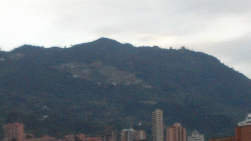 2012-07-27_19-03-31_776.jpg - Late afternoon view of Medellin, from the Forum Skyscraper, 23rd floor