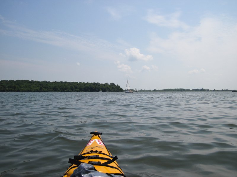 ShabbonaKayak070713-5574.jpg - out on the open lake.  It's windy and the water has a little chop.  Note: sailboat in the distance