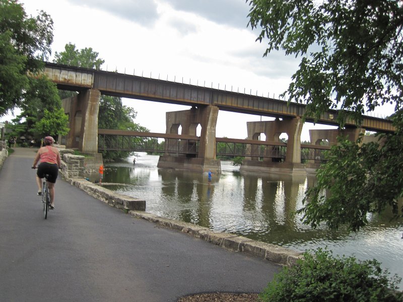 PrairiePathFoxRiver080413-5719.jpg - Biking South along the Fox River. Metra's Union Pacific/West Line railroad bridge near the Geneva Station