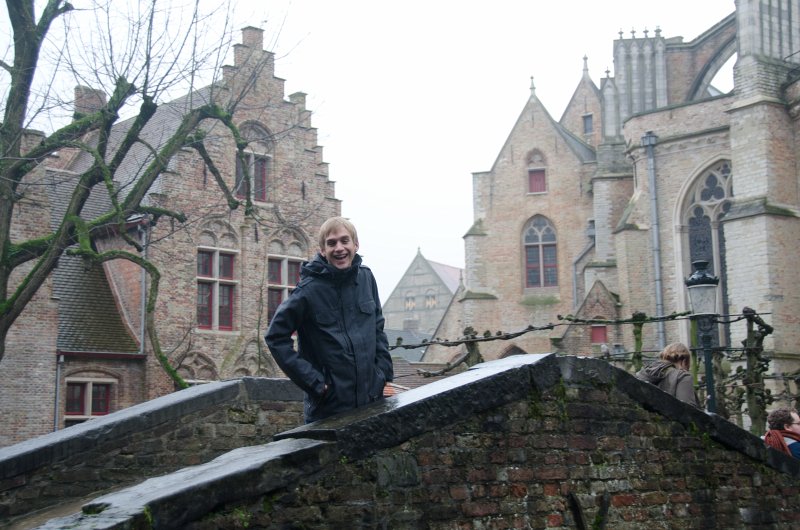 Bruges010413-4997.jpg - Mike on Pedestrian Bridge over Dijver Canal near Onze-Lieve-Vrouwekerk Church of Our Lady