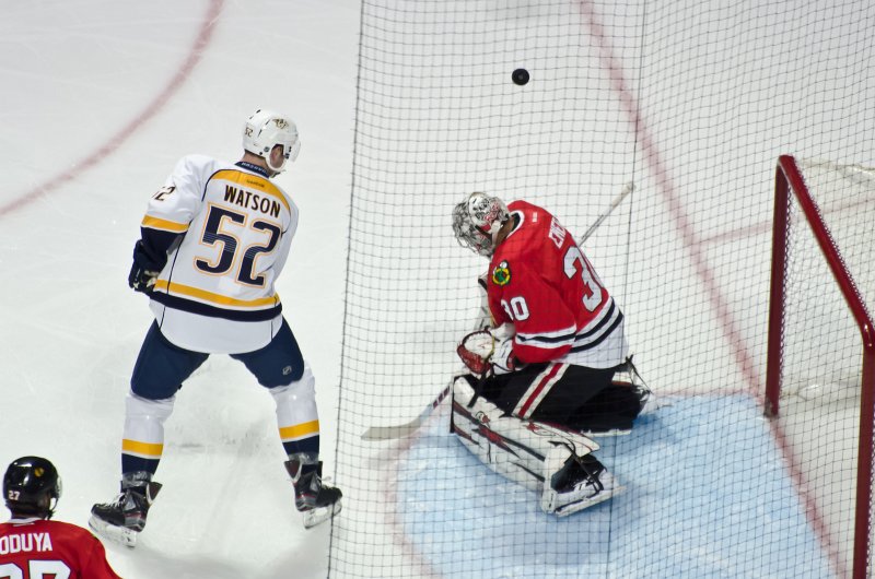 BlackHawks040713-6101.jpg - Emery, saving a shot on goal. Nashville Predators vs Chicago Blackhawks Hockey