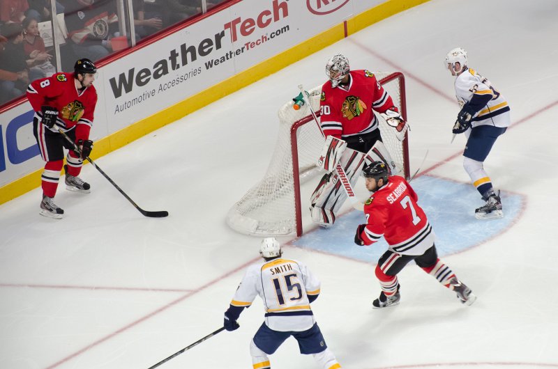 BlackHawks040713-6122.jpg - Emery, Seabrook looking at Leddy. Nashville Predators vs Chicago Blackhawks Hockey