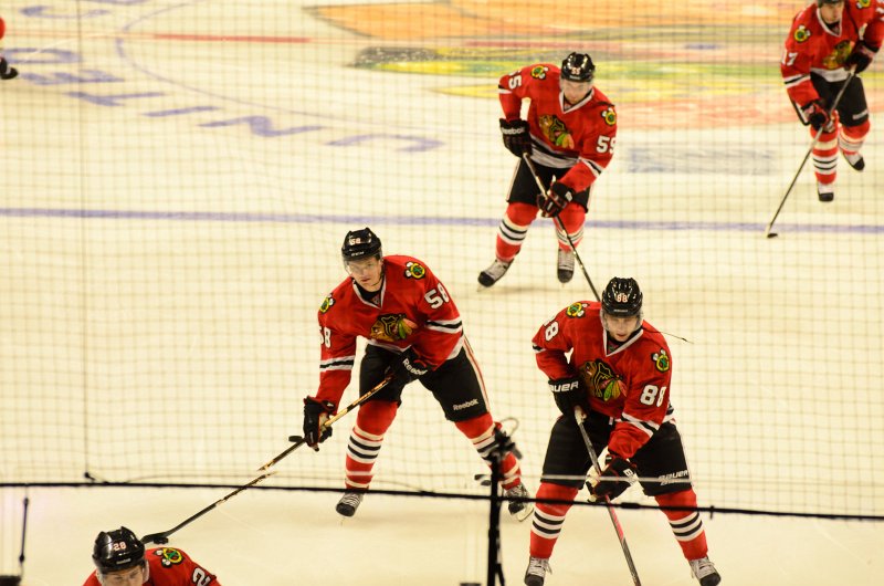 BlackHawks091713-8496.jpg - 55-Ryan Stanton 88-Patrick Kane 58-Byron Froese. Blackhawks vs Detroit preseason game