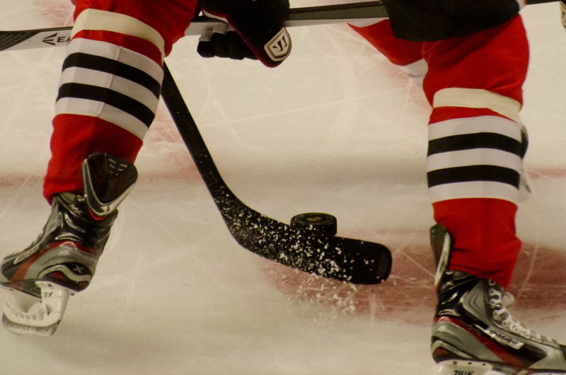 BlackHawks091713-8520.jpg - Close up of a face-off. Blackhawks vs Detroit preseason game