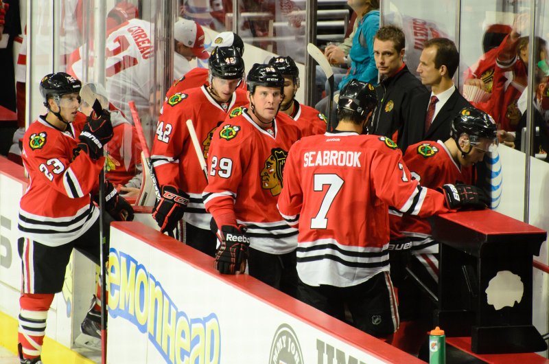 BlackHawks091713-8542.jpg - 23-Teuvo Teravainen 42-Joakim Nordstrom 29-Bryan Bickell 7-Brent Seabrook leaving for the locker room.  Between period intermission. Blackhawks vs Detroit preseason game