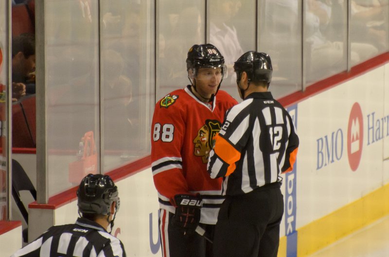 BlackHawks091713-8546.jpg - Kane and the Ref discussing a penalty. Blackhawks vs Detroit preseason game