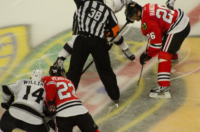 Blackhawks121513-9786.jpg - Handzus facing off at center ice. Kings vs Blackhawks hockey, United Center, Chicago