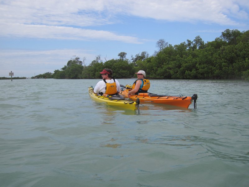 Captiva041813-5076.jpg - Jack and Cathie. Kayaking around Buck Kay, very smooth water.  Winds from the NNE.  Paddled back with Dolphin.