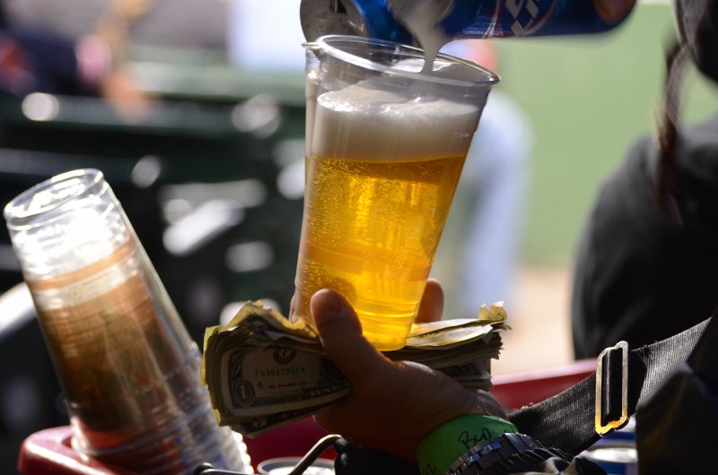 CubsVsReds081313-8074.jpg - Bud Light Beer Vendor;. Cubs vs Reds at Wrigley FIeld